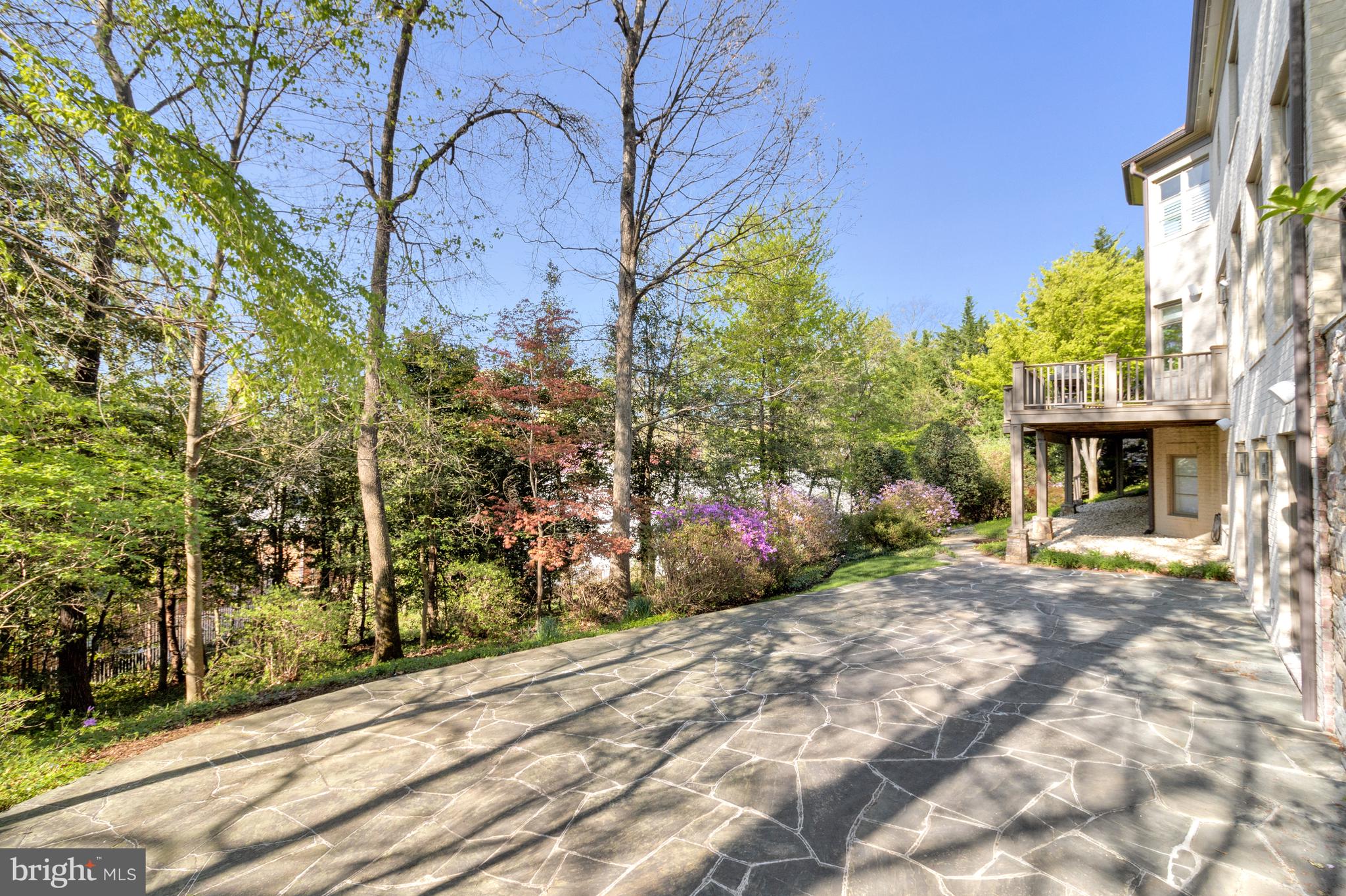 4502 32nd Road North Arlington, VA 22207 - Photo 16 of 57 a front view of a house with a yard and garage