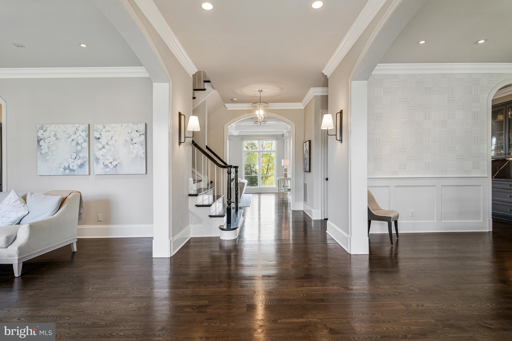 4502 32nd Road North Arlington, VA 22207 - Photo 17 of 57 a hallway with wooden floor and furniture