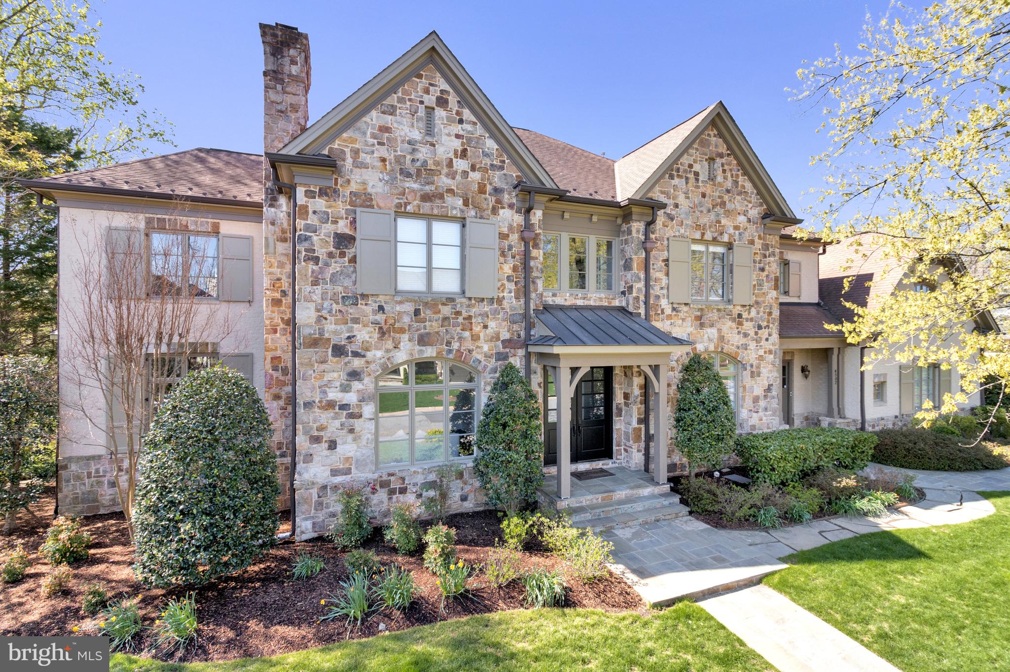 4502 32nd Road North Arlington, VA 22207 - Photo 2 of 57 a front view of a house with garden