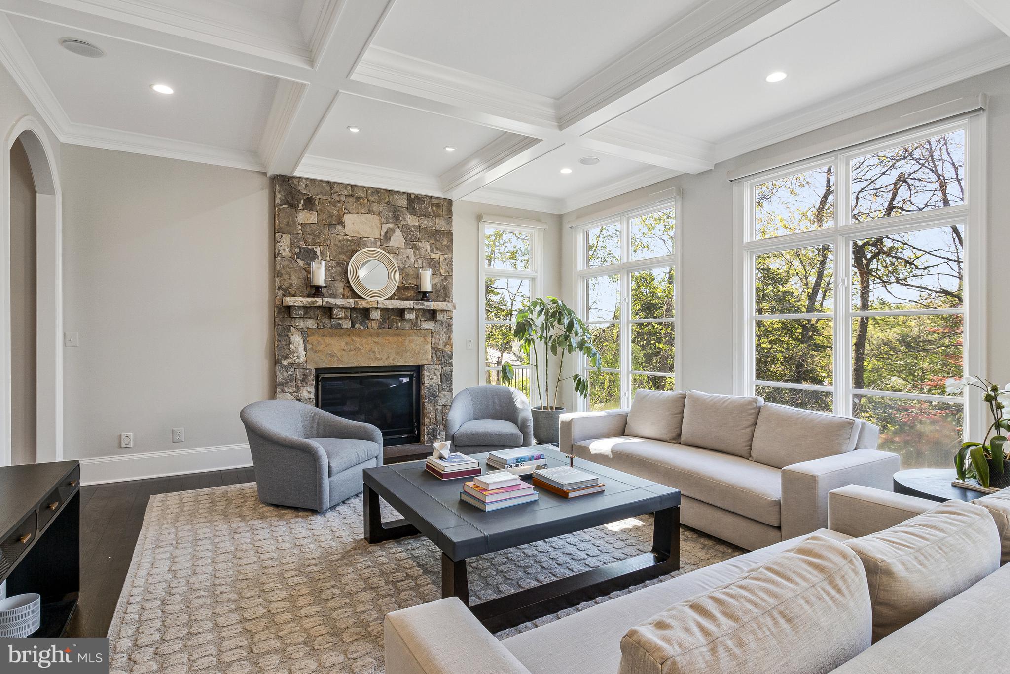 4502 32nd Road North Arlington, VA 22207 - Photo 32 of 57 a living room with furniture a large window and a fireplace