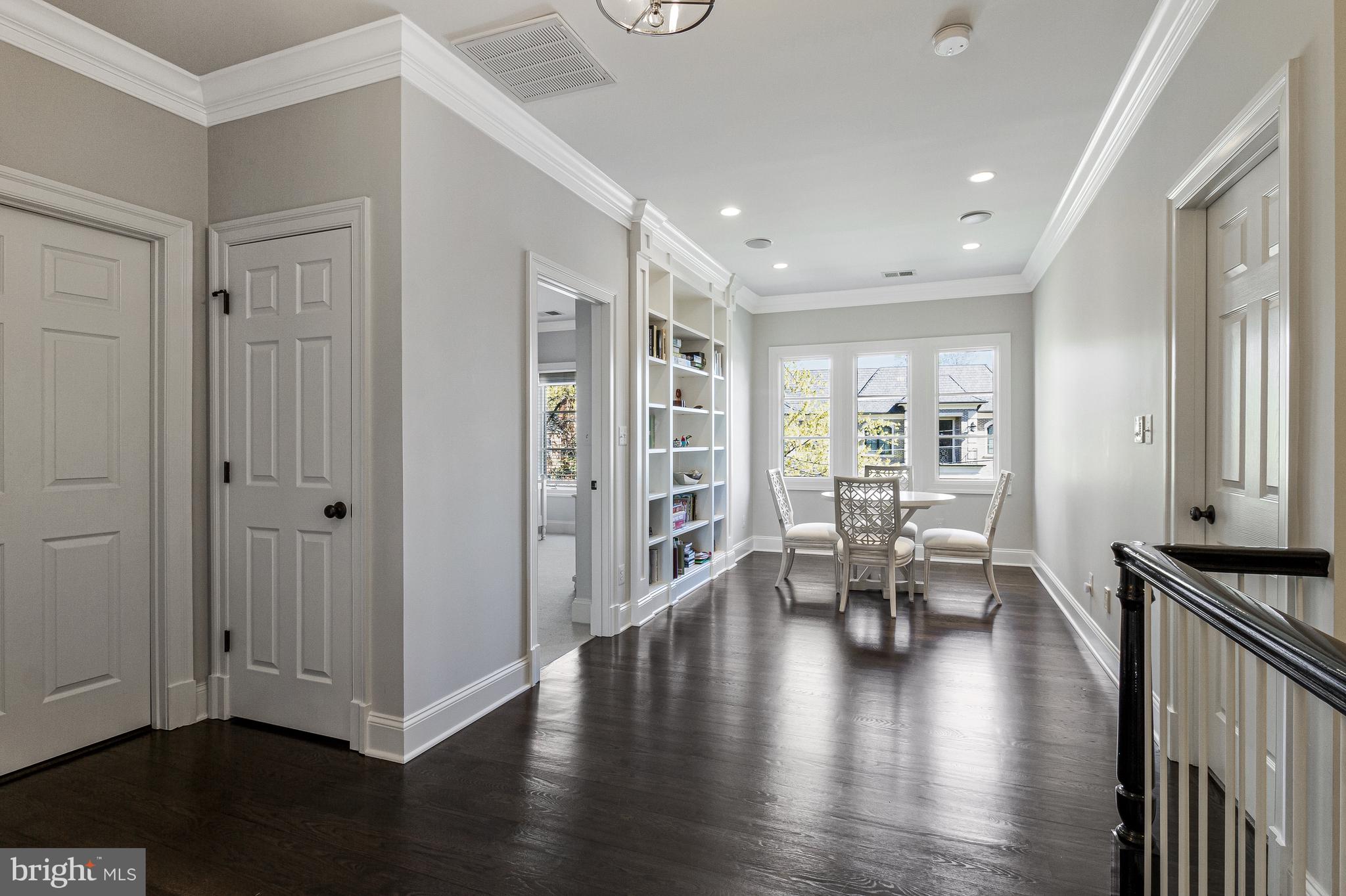 4502 32nd Road North Arlington, VA 22207 - Photo 53 of 57 a view of an empty room with wooden floor and a window