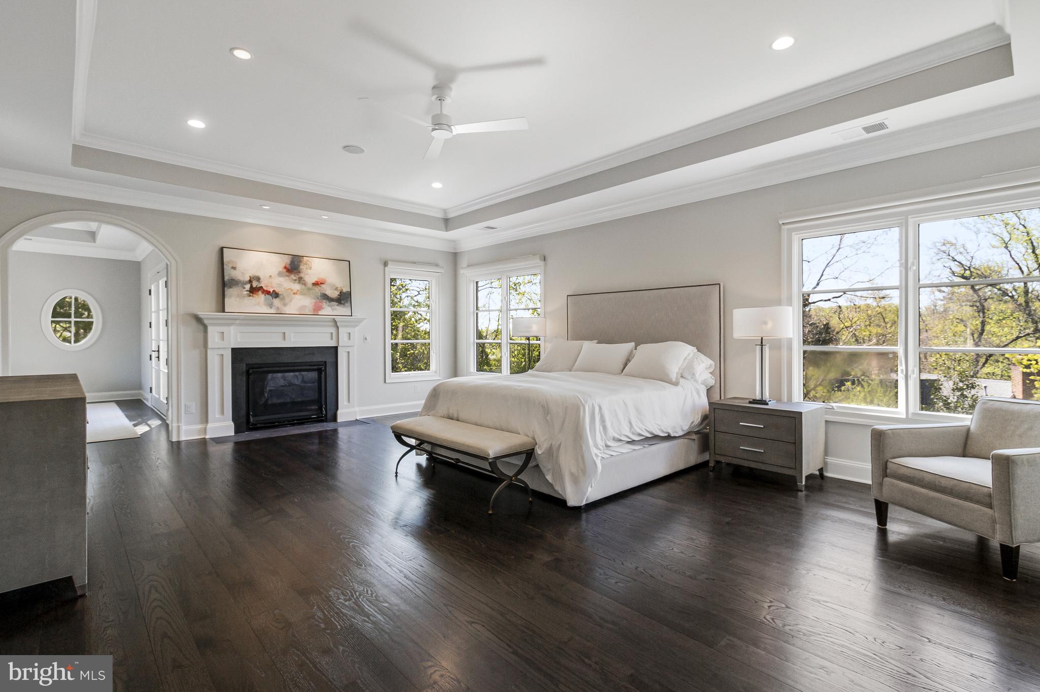 4502 32nd Road North Arlington, VA 22207 - Photo 54 of 57 a bed sitting in a spacious bedroom next to a window