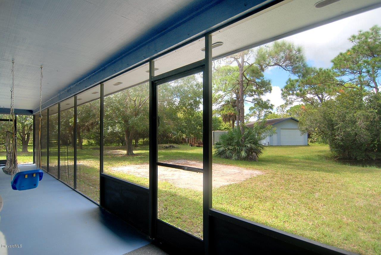4566 Mustang Road Melbourne, FL 32934 - Photo 14 of 14 xporch