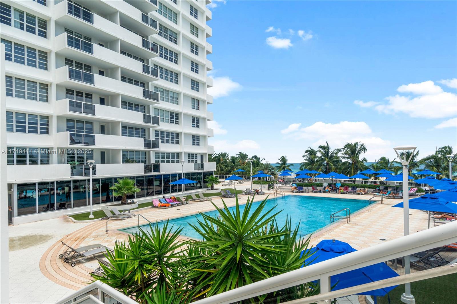 100 Lincoln Road, Unit 1411 Miami Beach, FL 33139 - Photo 25 of 36 a view of a swimming pool from a balcony