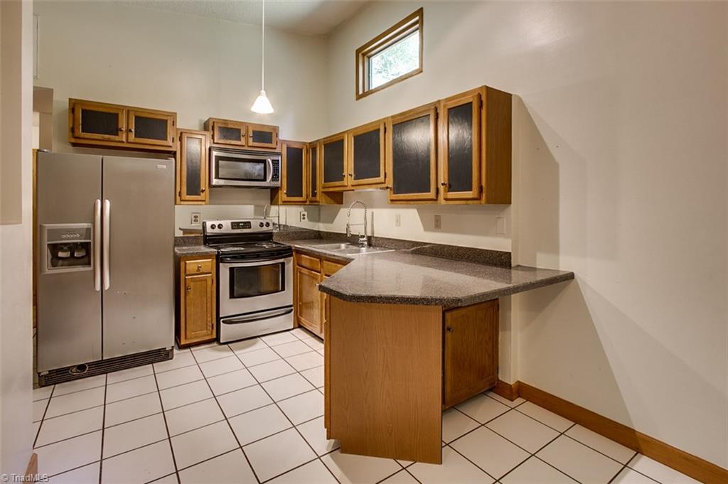 6886 Coltrane Mill Road Randleman, NC 27317 - Photo 8 of 30 Kitchen, ceramic tile floor