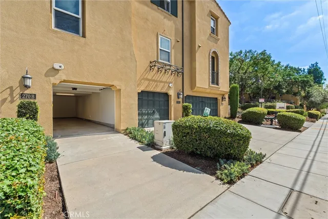 a view of a building with a garden