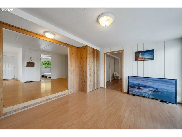 a balcony with table and chairs