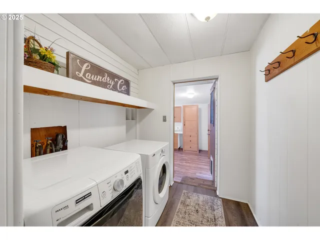 a view of a patio with a table and chairs