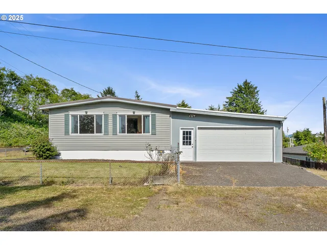 a house view with a garden space