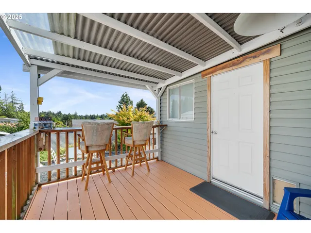 a view of a chairs and table in the terrace