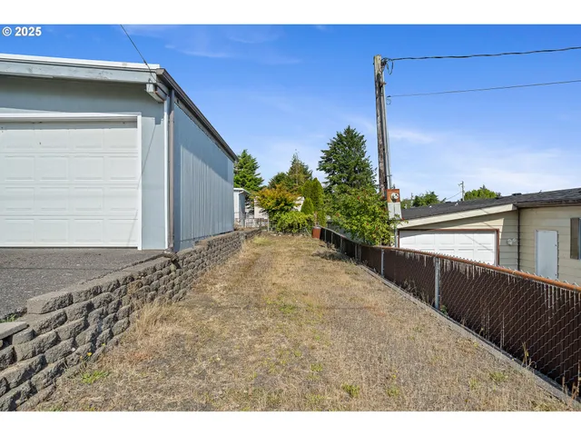 a view of a swimming pool with an outdoor seating