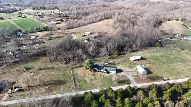 a bedroom with furniture and window
