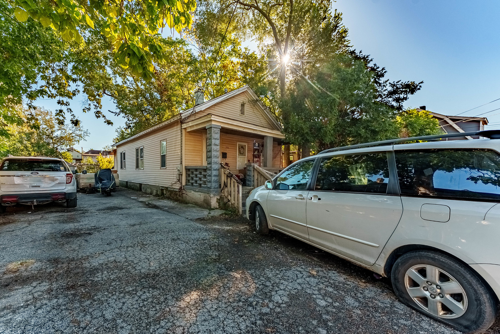 254 Mc Roberts Street Joliet, IL 60432 - Photo 2 of 15 a view of a car in front of house