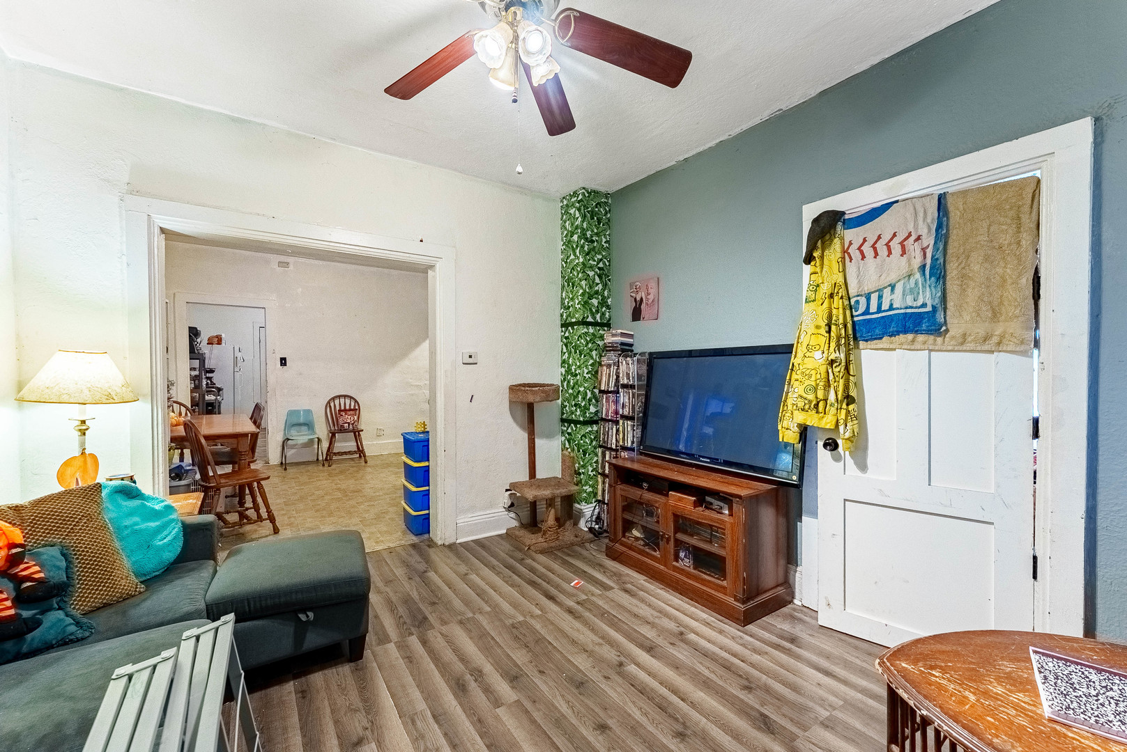 254 Mc Roberts Street Joliet, IL 60432 - Photo 3 of 15 a living room with furniture and a fireplace