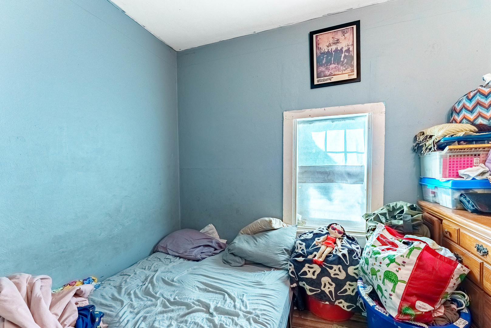 254 Mc Roberts Street Joliet, IL 60432 - Photo 6 of 15 a bedroom with a bed and a window