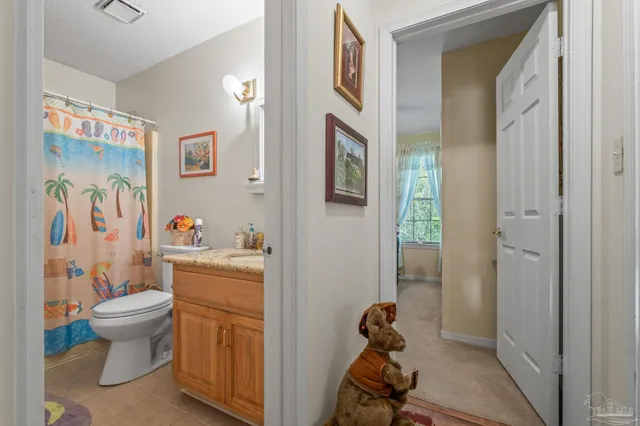 a very nice looking room with a sink and a mirror