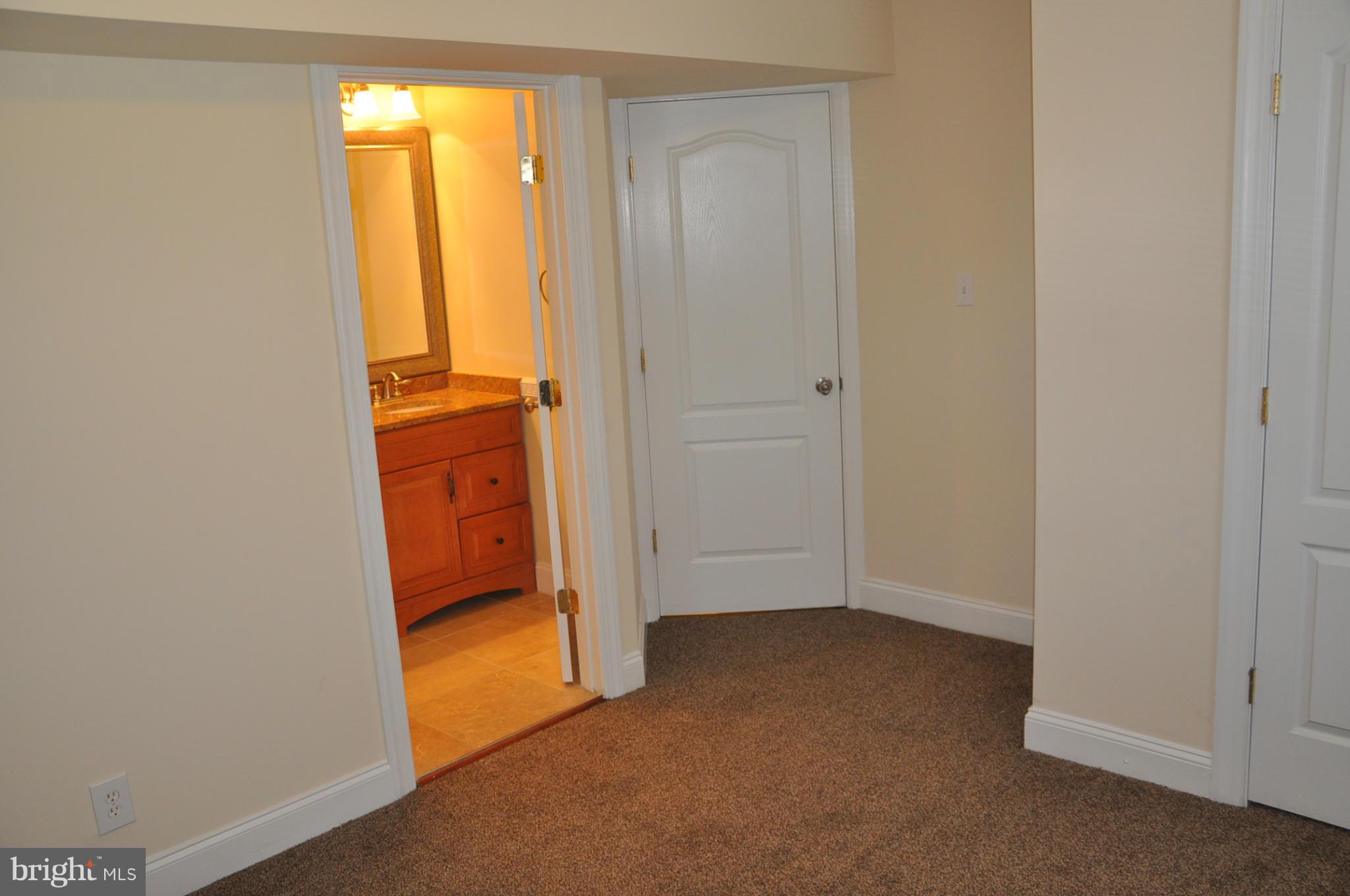 1500 Eaton Road Southeast, Unit 102 Washington, DC 20020 - Photo 14 of 27 Bedroom 2 Private Bath Entrance