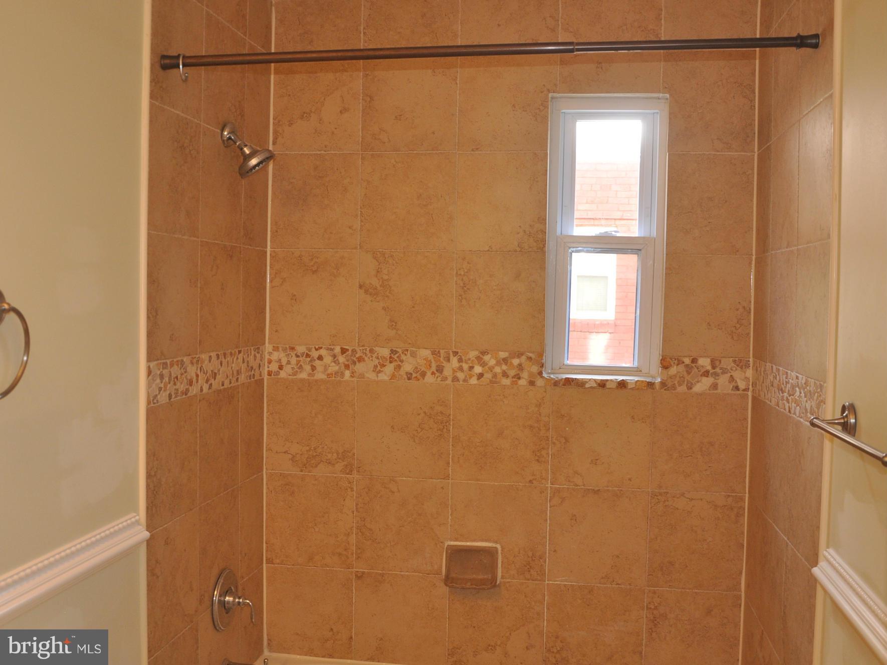 1500 Eaton Road Southeast, Unit 102 Washington, DC 20020 - Photo 21 of 27 Gorgeous Tile Bath 2