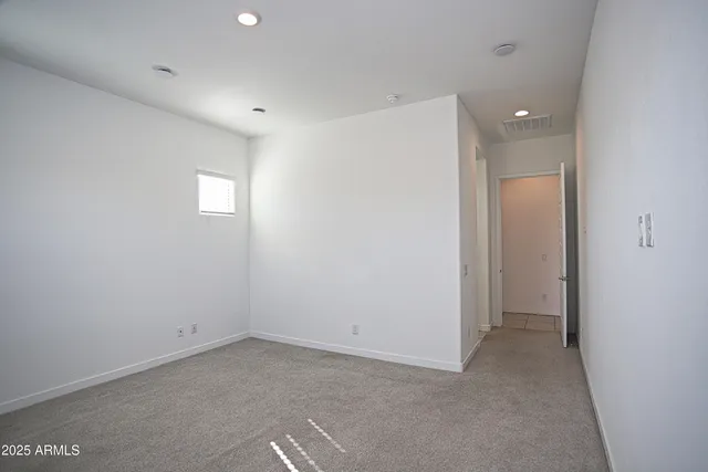 a bathroom with a granite countertop sink double and mirror