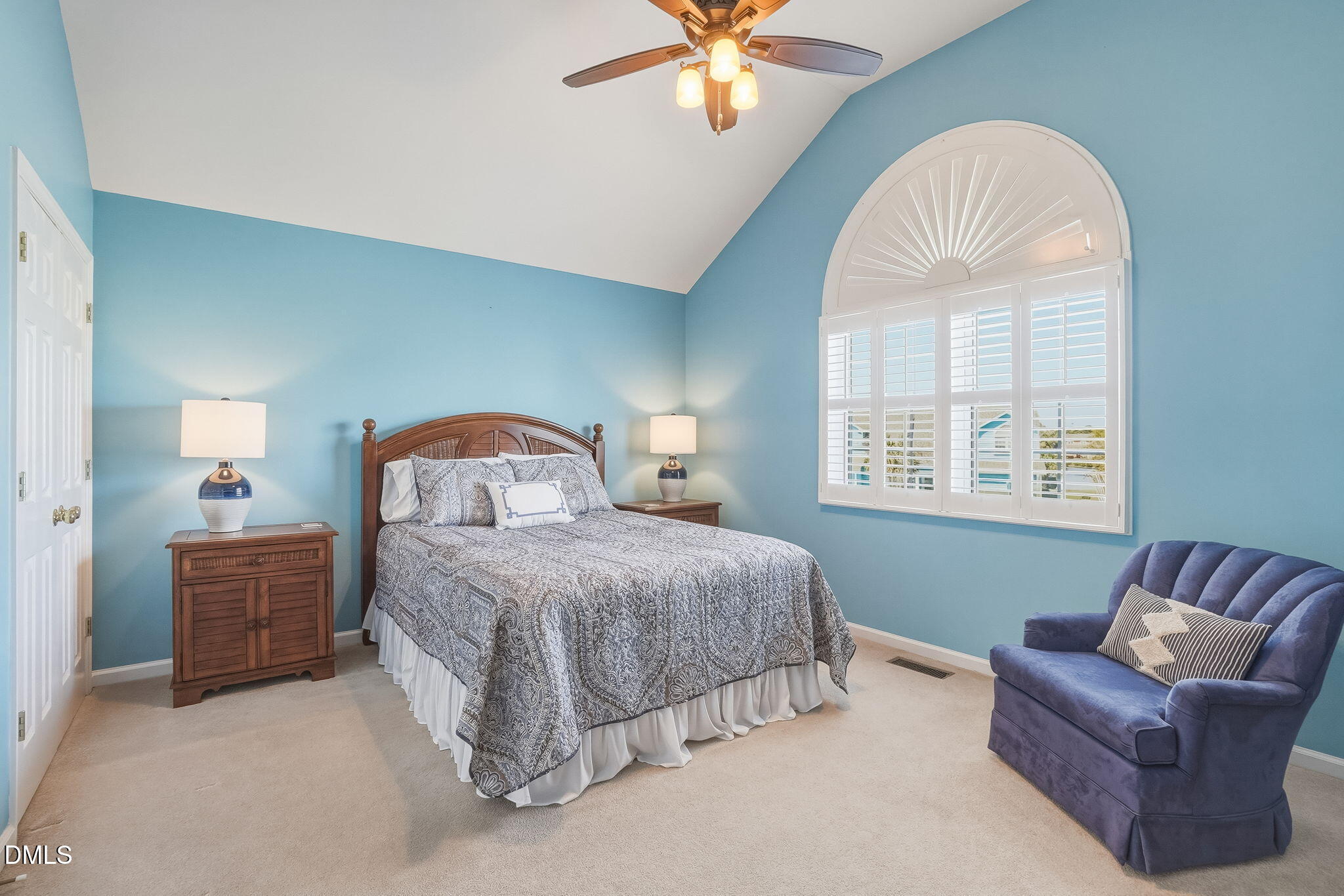 805 Sloop Pointe Lane Kure Beach, NC 28449 - Photo 11 of 20 a bedroom with a bed couch and window