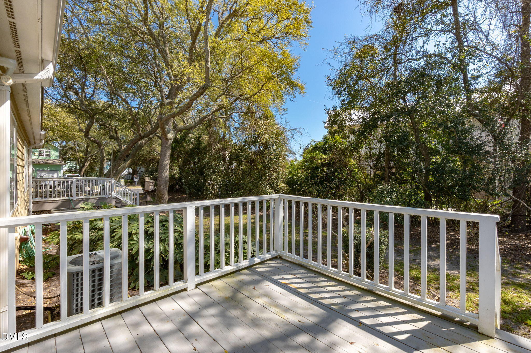 805 Sloop Pointe Lane Kure Beach, NC 28449 - Photo 14 of 20 a view of a wooden fence