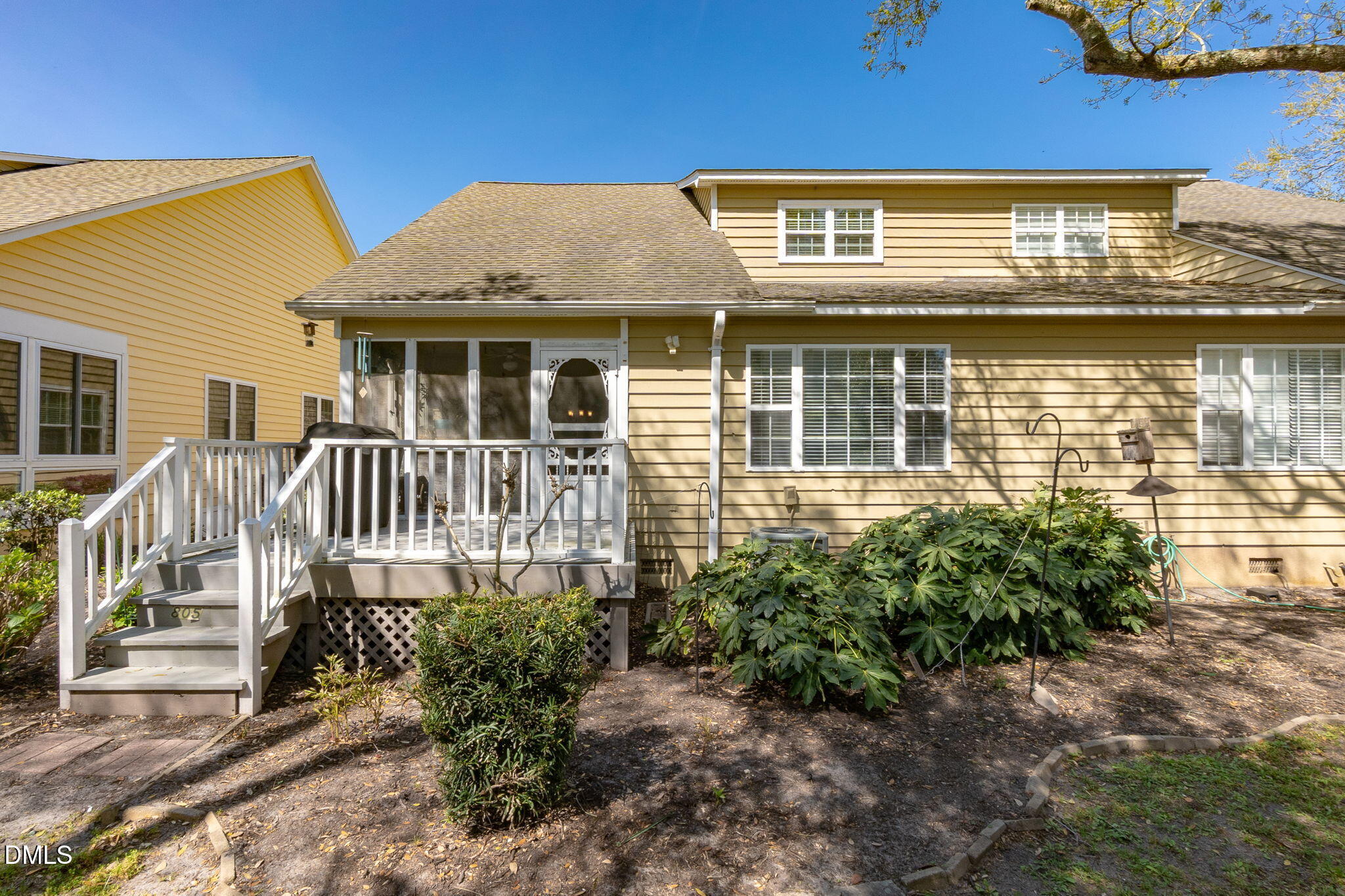 805 Sloop Pointe Lane Kure Beach, NC 28449 - Photo 17 of 20 a front view of a house with a yard