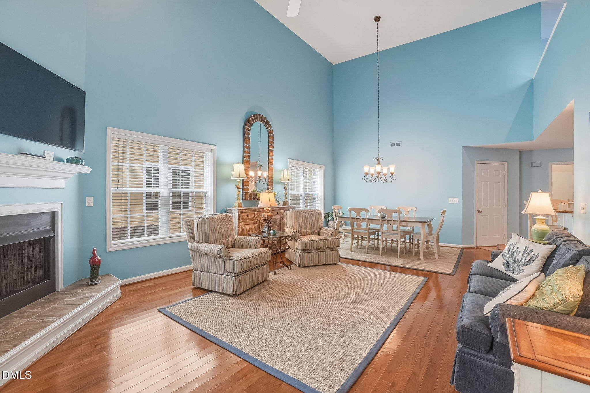 805 Sloop Pointe Lane Kure Beach, NC 28449 - Photo 2 of 20 a living room with furniture fireplace and flat screen tv
