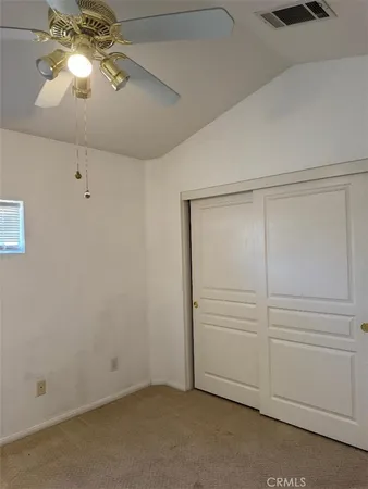 a bathroom with a toilet and a bathtub