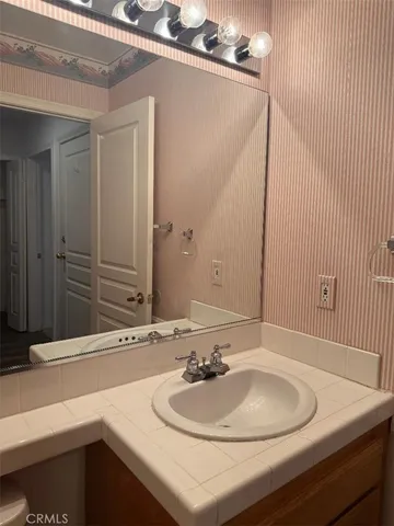 a bathroom with a shower and a toilet