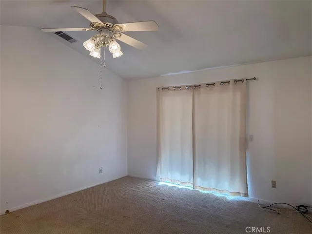 a view of a back yard of the house