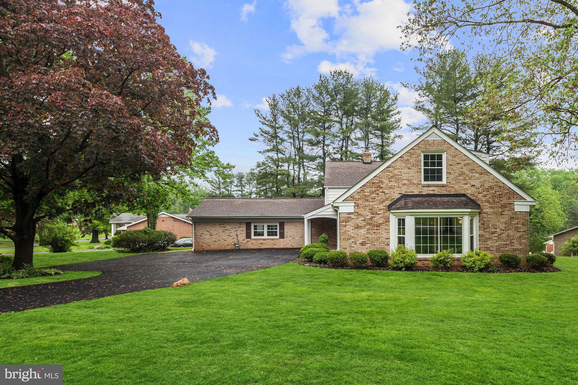 1301 Midmeadow Road Towson, MD 21286 - Photo 1 of 30 a front view of house with yard and green space