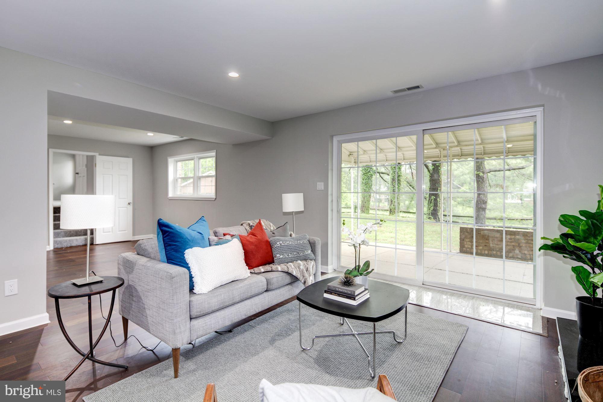 1301 Midmeadow Road Towson, MD 21286 - Photo 12 of 30 a living room with furniture and a large window