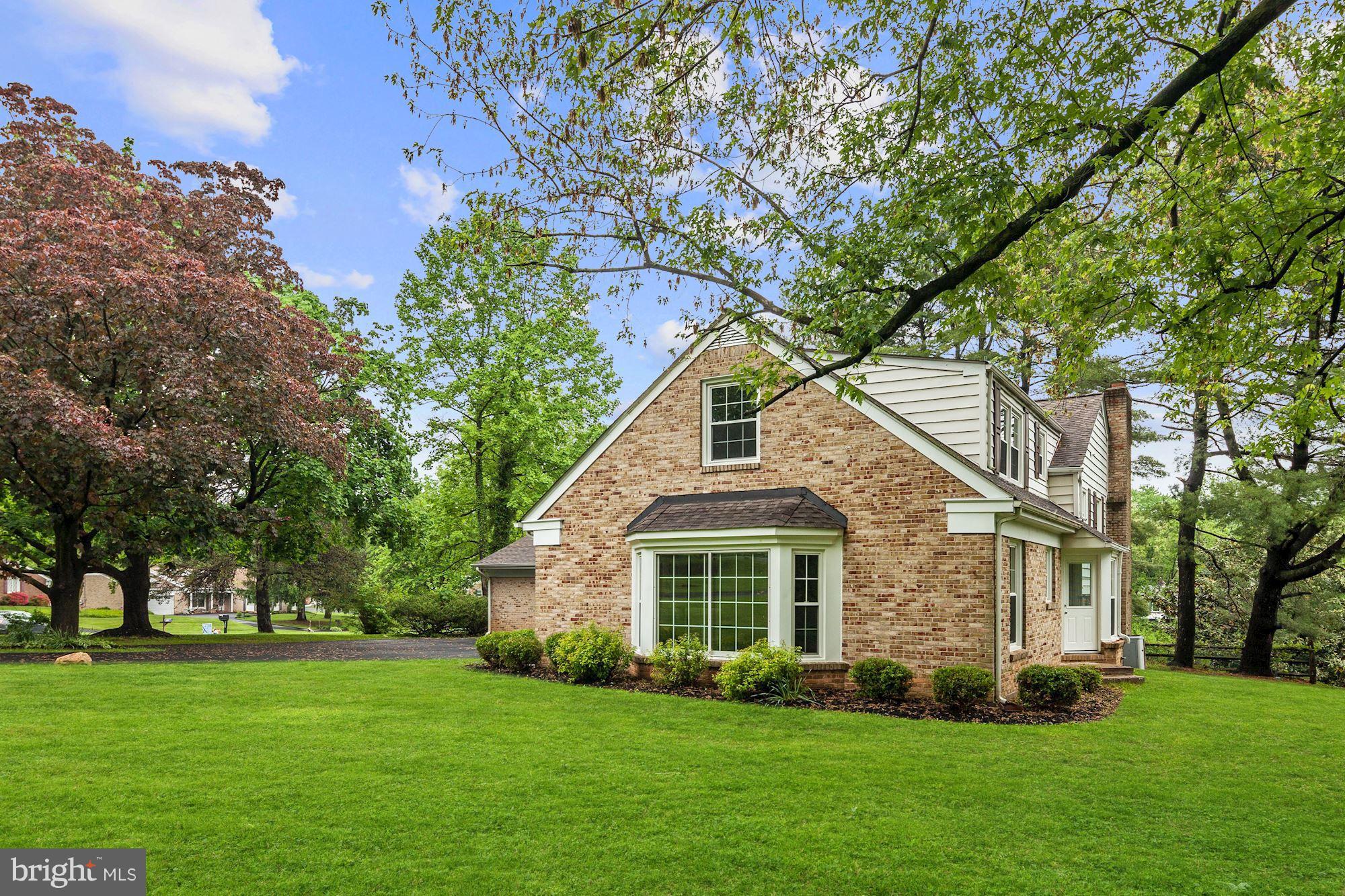 1301 Midmeadow Road Towson, MD 21286 - Photo 29 of 30 a front view of a house with a garden