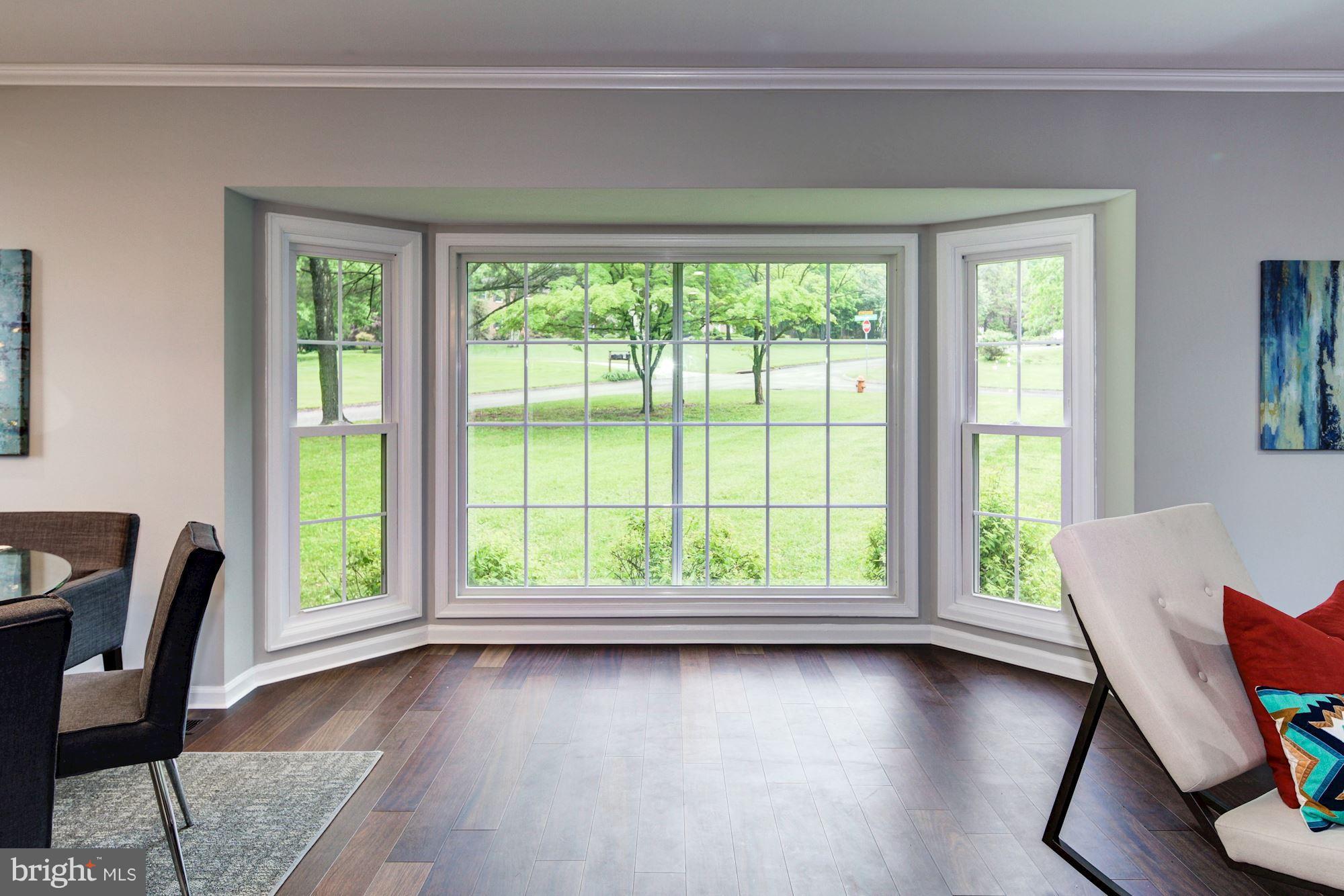 1301 Midmeadow Road Towson, MD 21286 - Photo 6 of 30 a view of a work space with wooden floor and a window