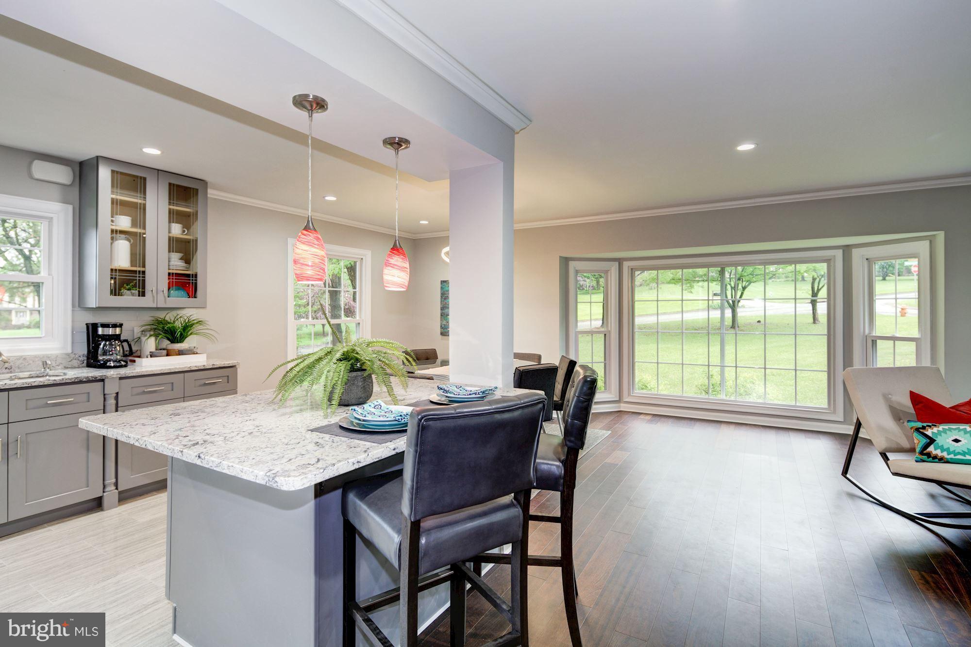 1301 Midmeadow Road Towson, MD 21286 - Photo 7 of 30 a view of a dining room with furniture and wooden floor