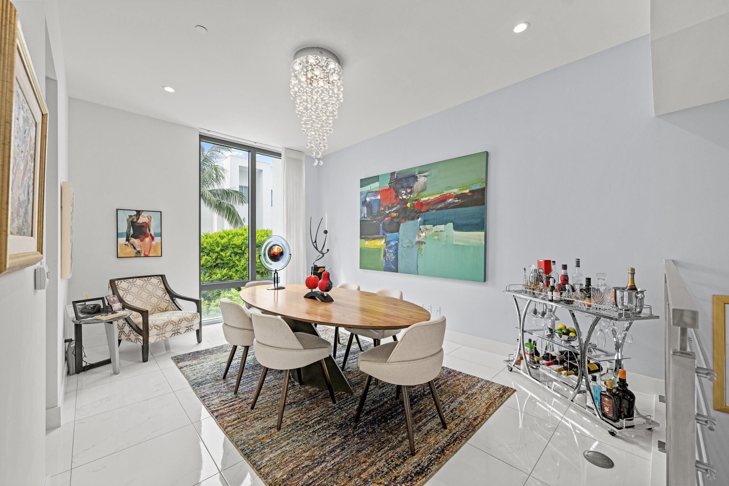 1811 Northwest 42nd Drive Boca Raton, FL 33431 - Photo 19 of 51 a view of a dining room with furniture and chandelier