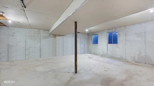 en empty room with windows