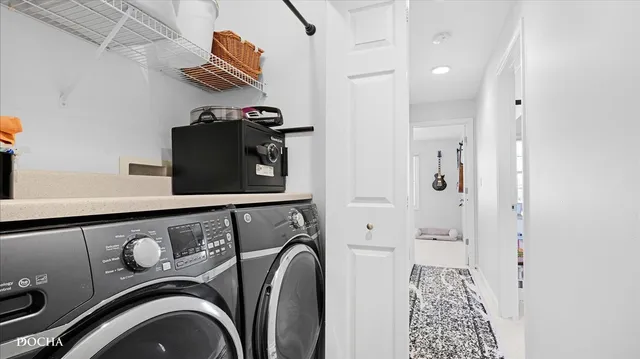 a utility room with dryer and washer