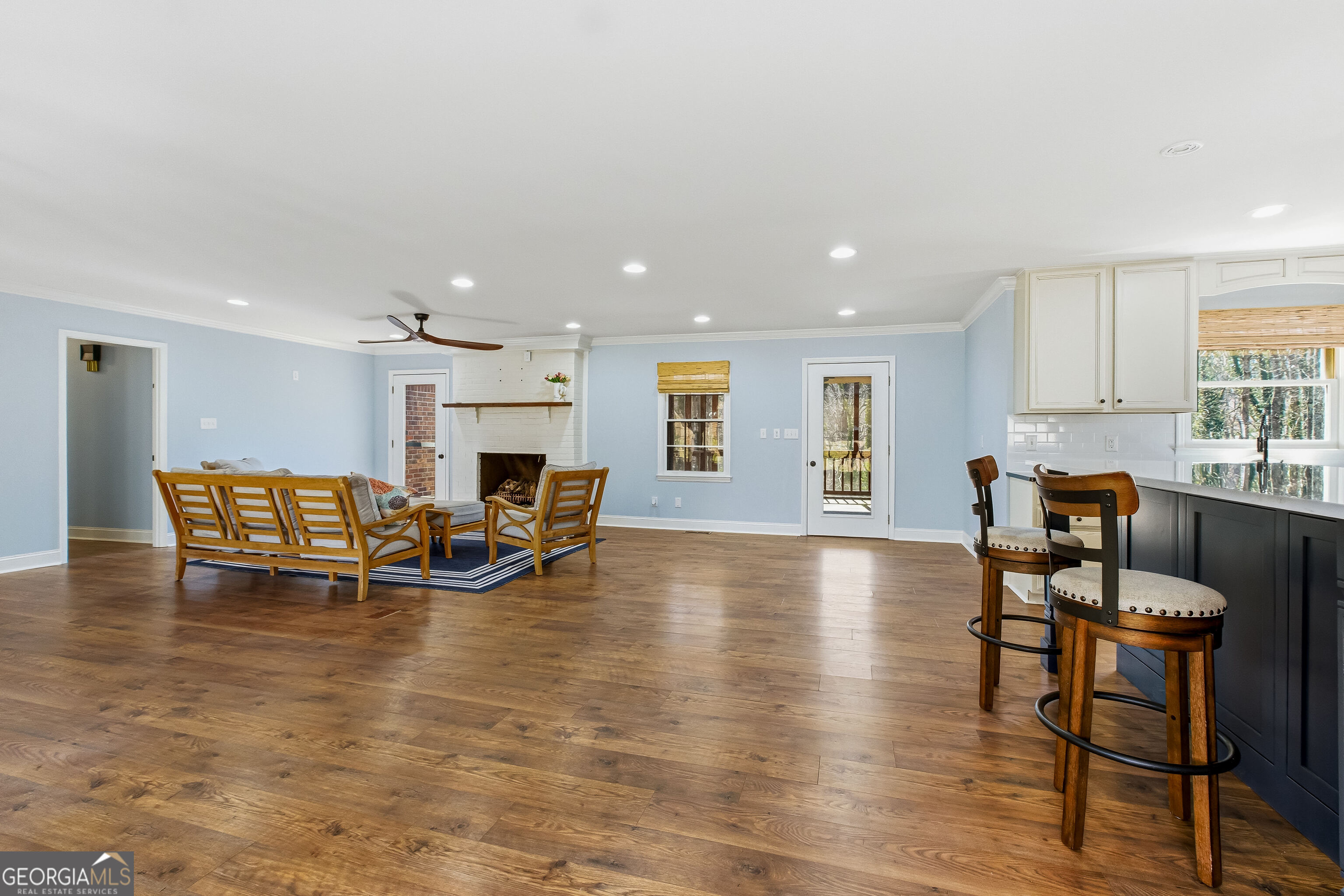 3302 Hickory Point Gainesville, GA 30506 - Photo 11 of 73 a living room with furniture and a dining table with kitchen view