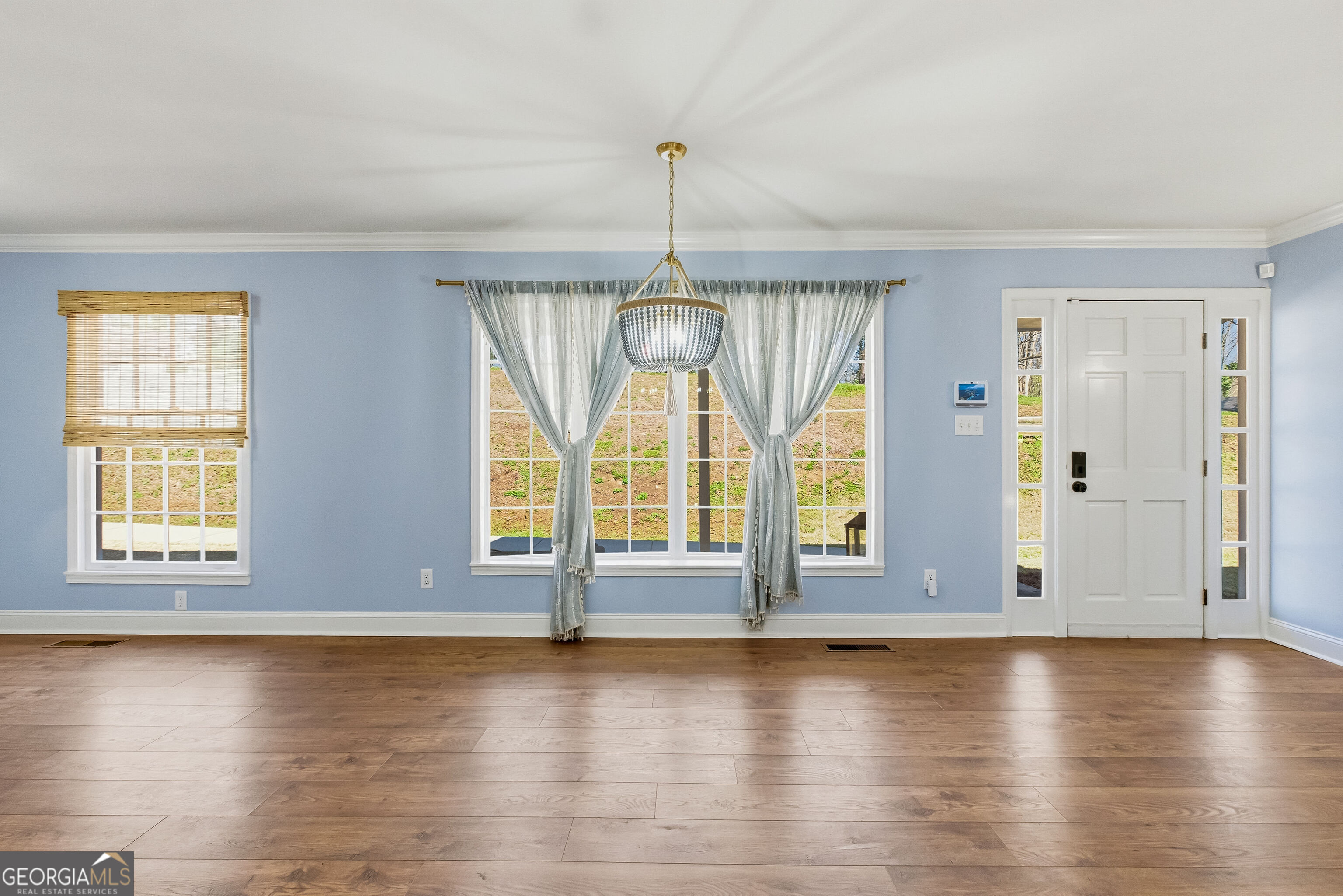 3302 Hickory Point Gainesville, GA 30506 - Photo 13 of 73 an empty room with wooden floor and windows