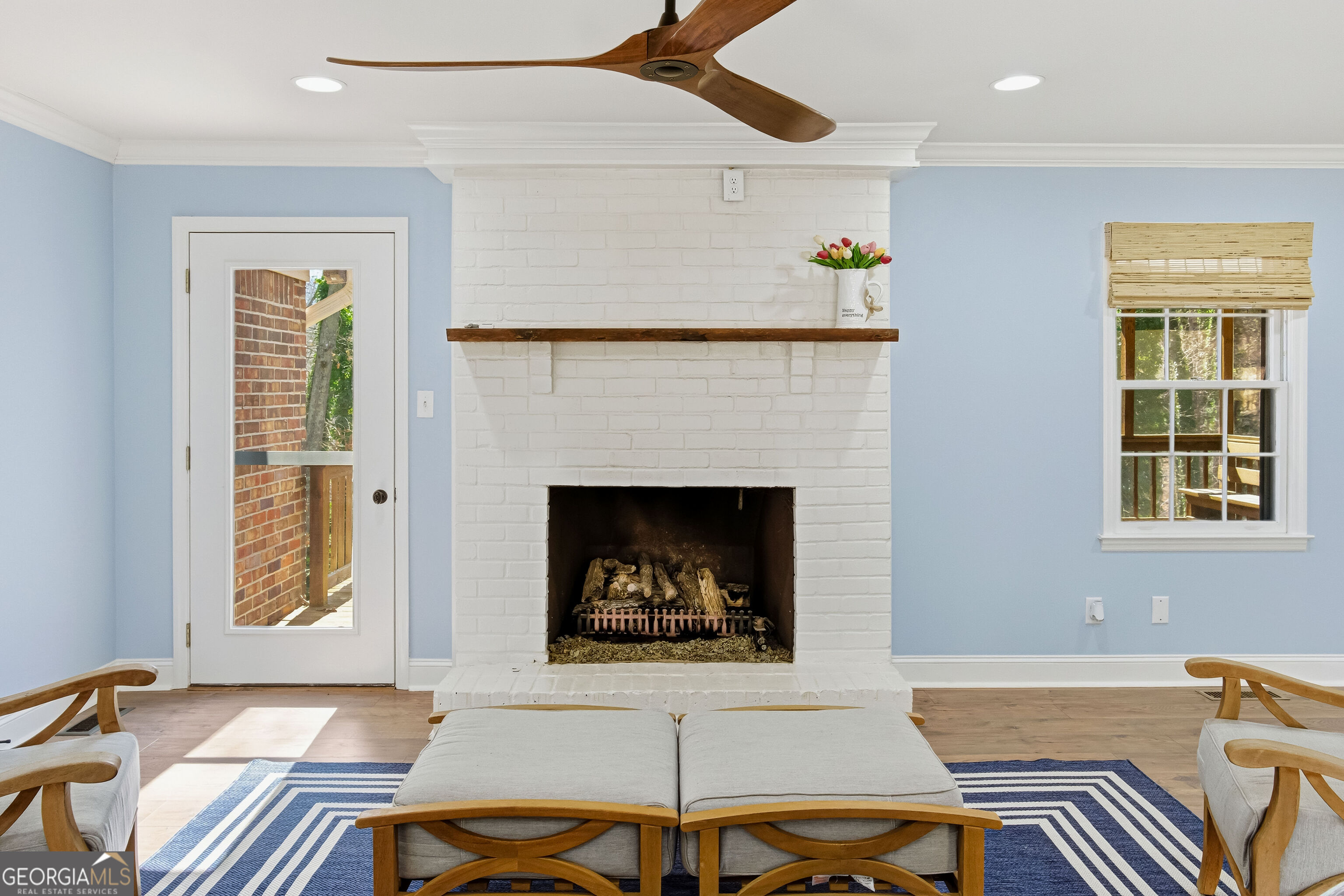 3302 Hickory Point Gainesville, GA 30506 - Photo 23 of 73 a living room with furniture and a fireplace