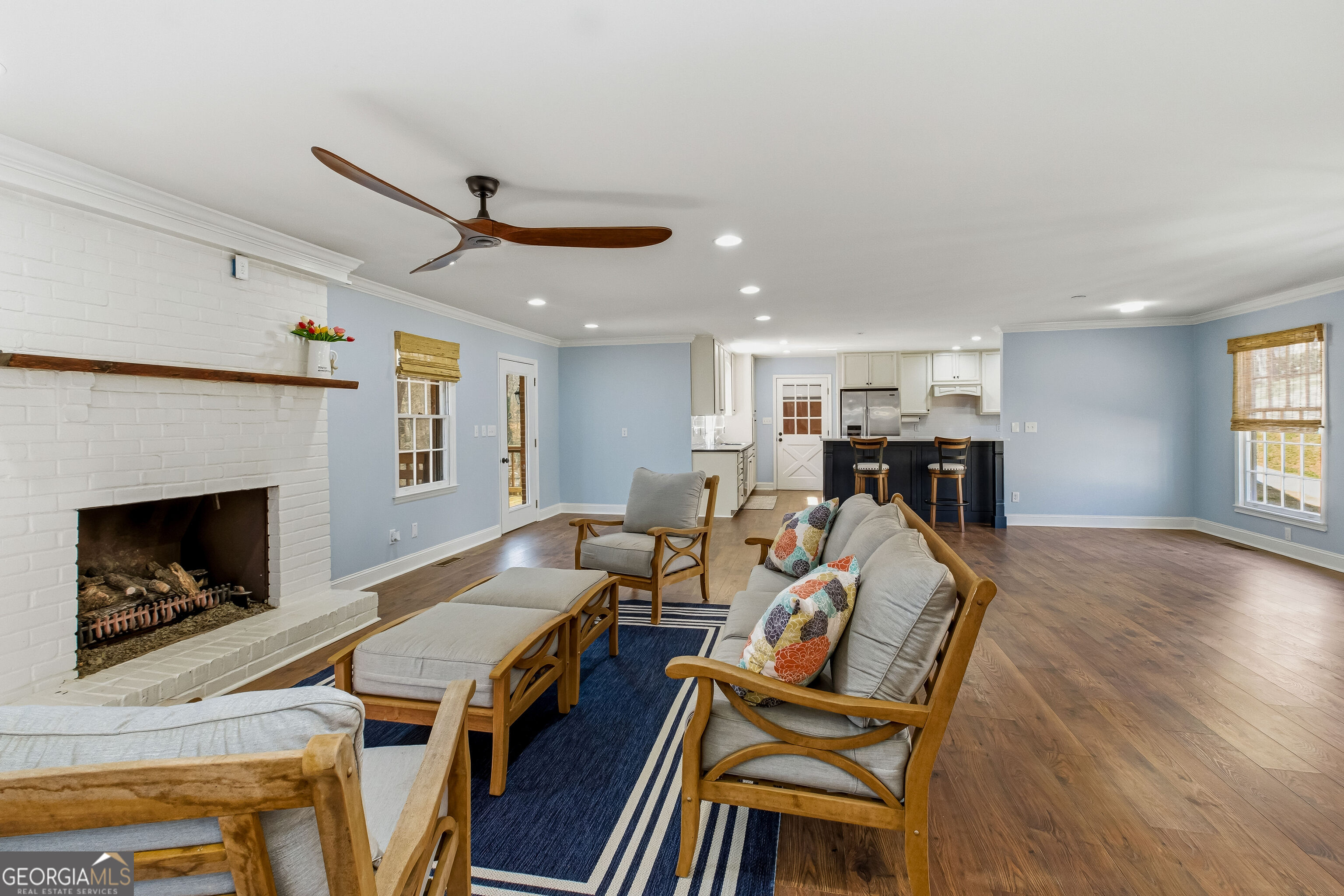 3302 Hickory Point Gainesville, GA 30506 - Photo 24 of 73 a living room with furniture a fireplace and a window