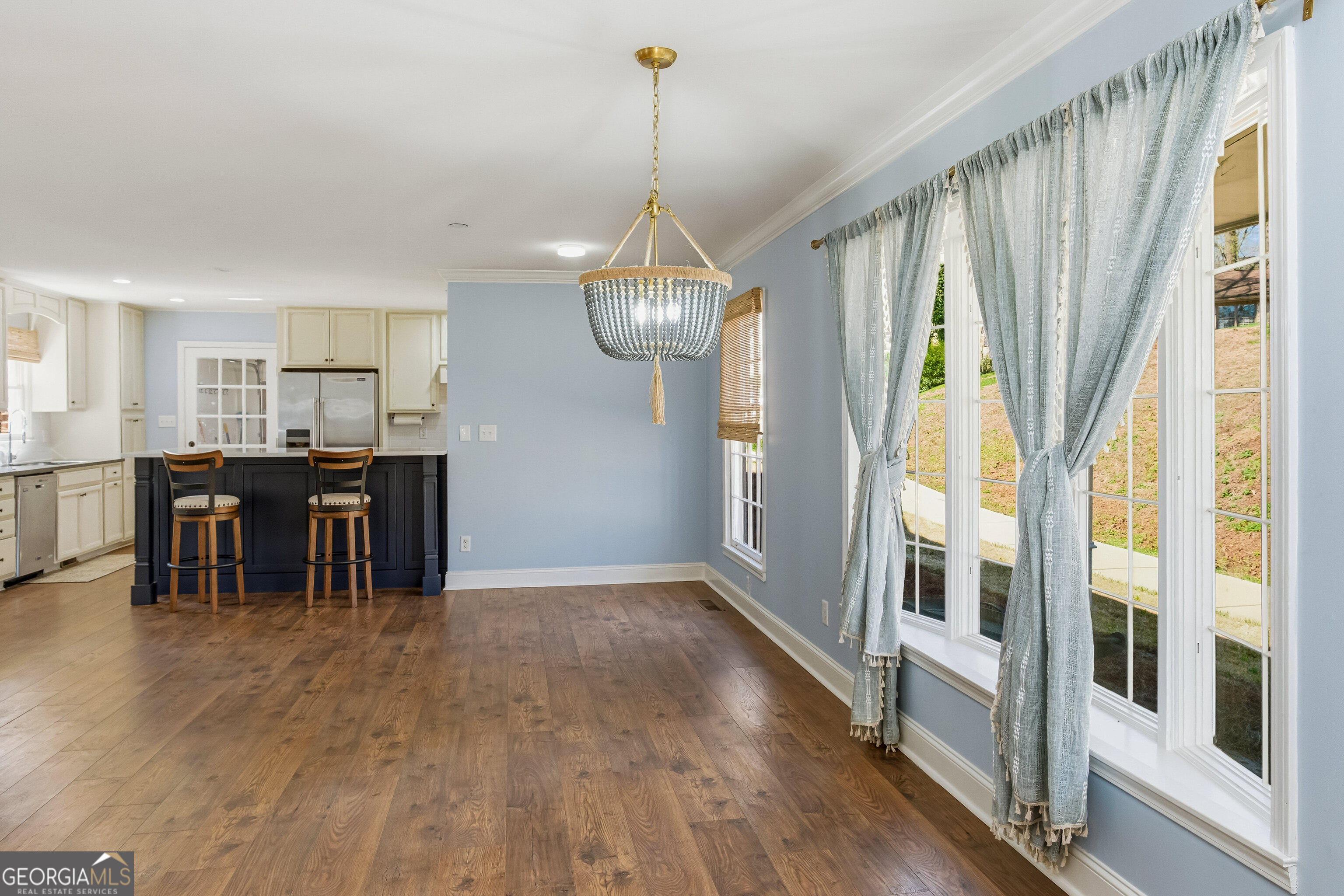 3302 Hickory Point Gainesville, GA 30506 - Photo 25 of 73 a view of a dining room with furniture and chandelier