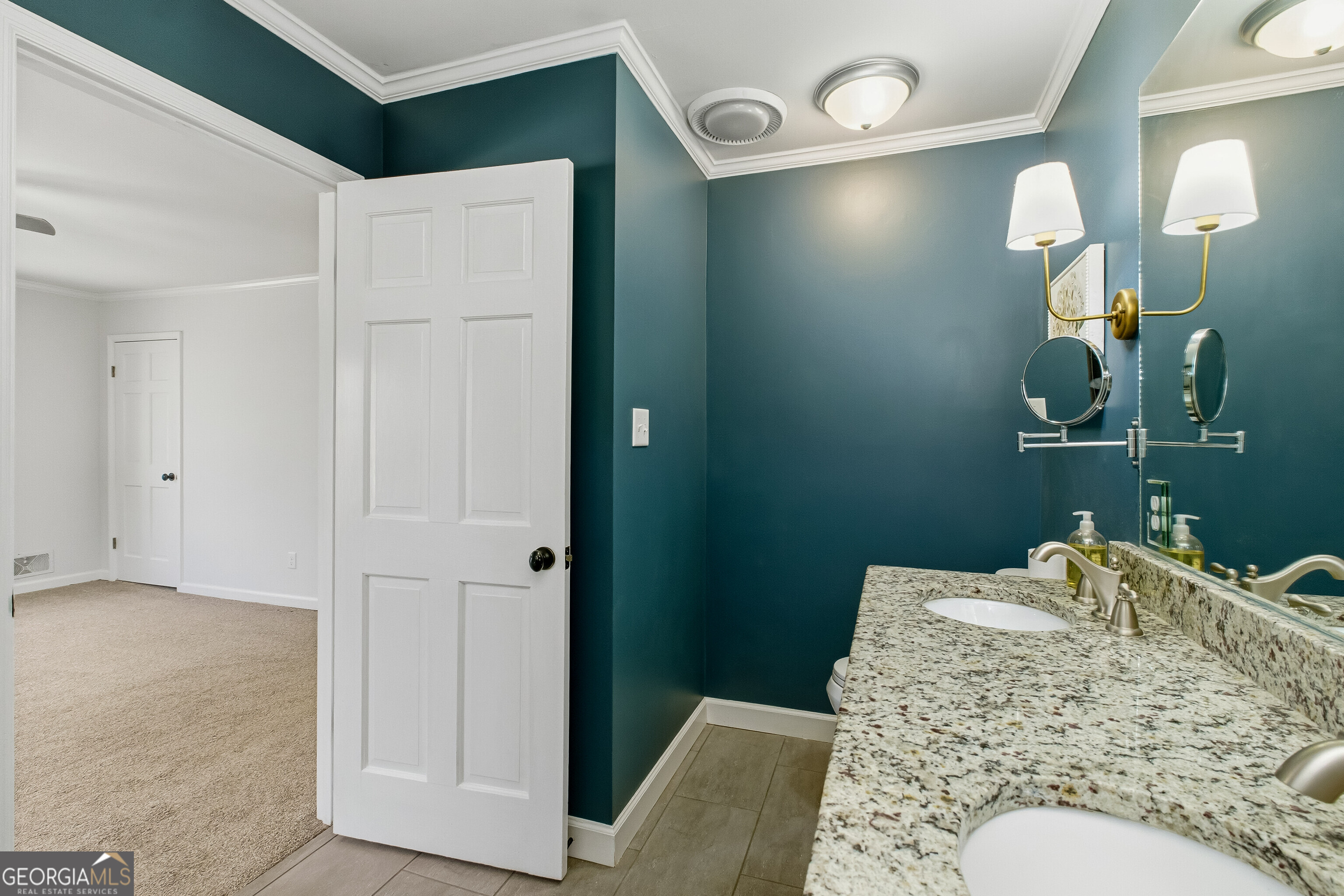 3302 Hickory Point Gainesville, GA 30506 - Photo 30 of 73 a bathroom with a sink and mirror