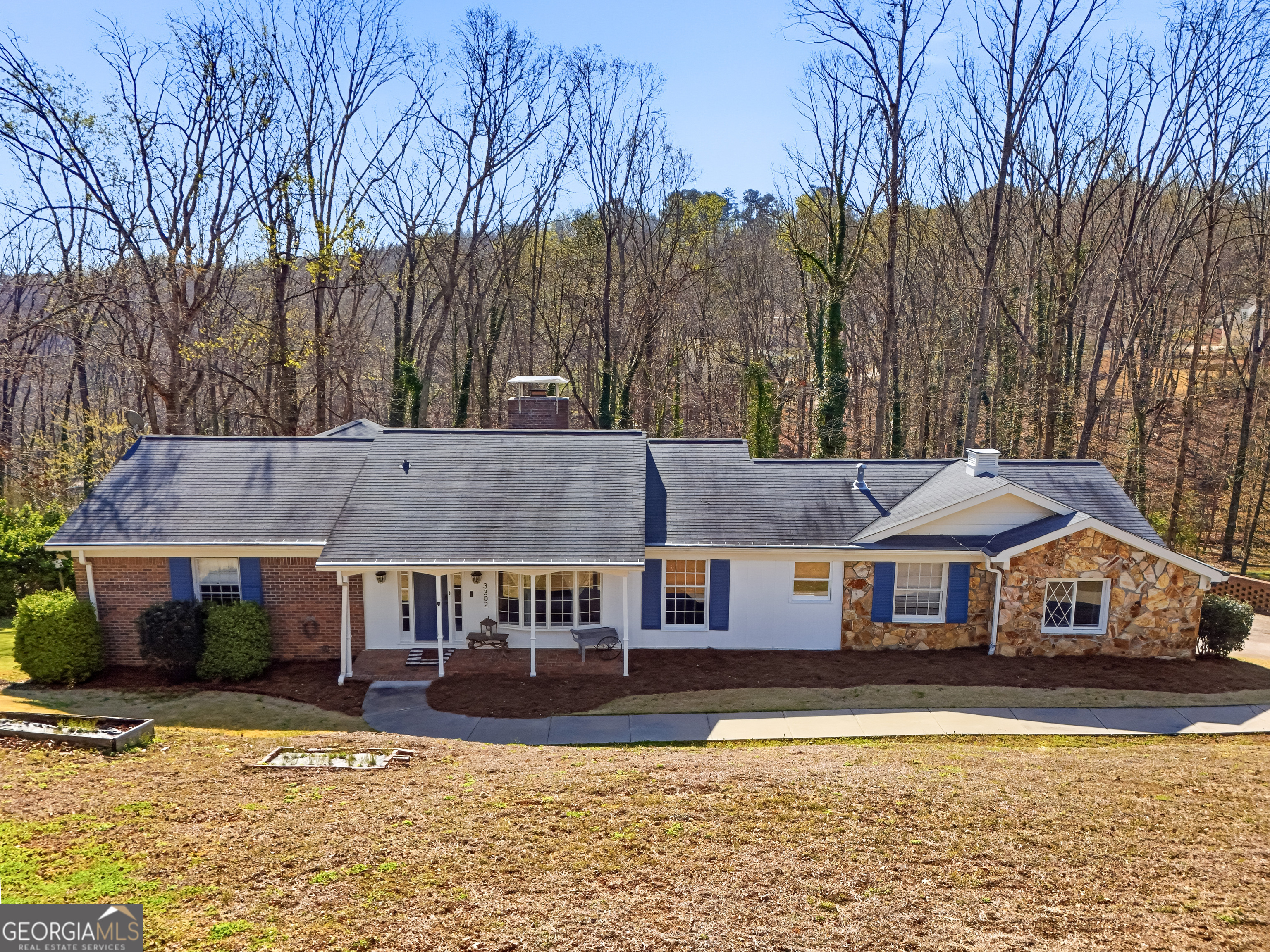 3302 Hickory Point Gainesville, GA 30506 - Photo 3 of 73 a aerial view of a house with swimming pool and sitting area