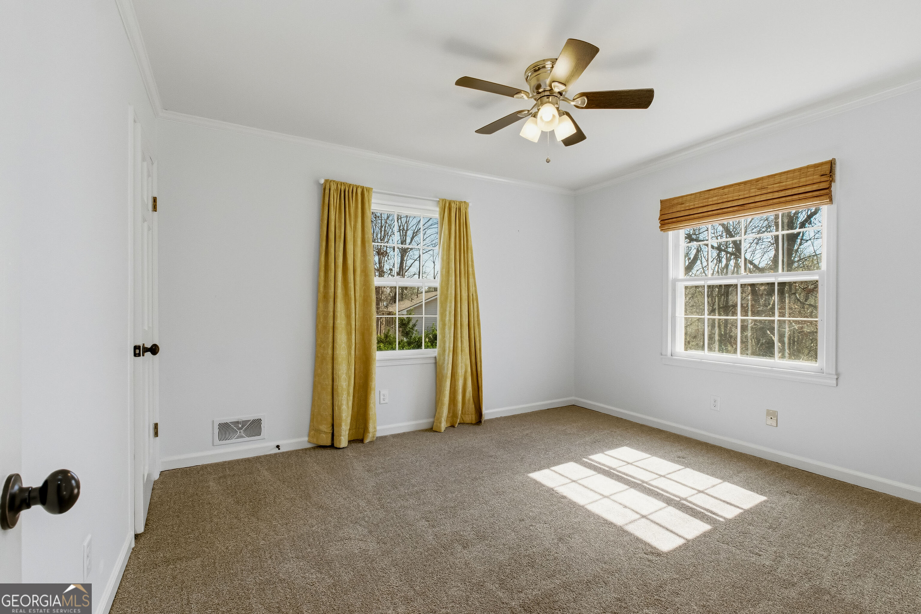 3302 Hickory Point Gainesville, GA 30506 - Photo 32 of 73 a view of a livingroom with a ceiling fan and window