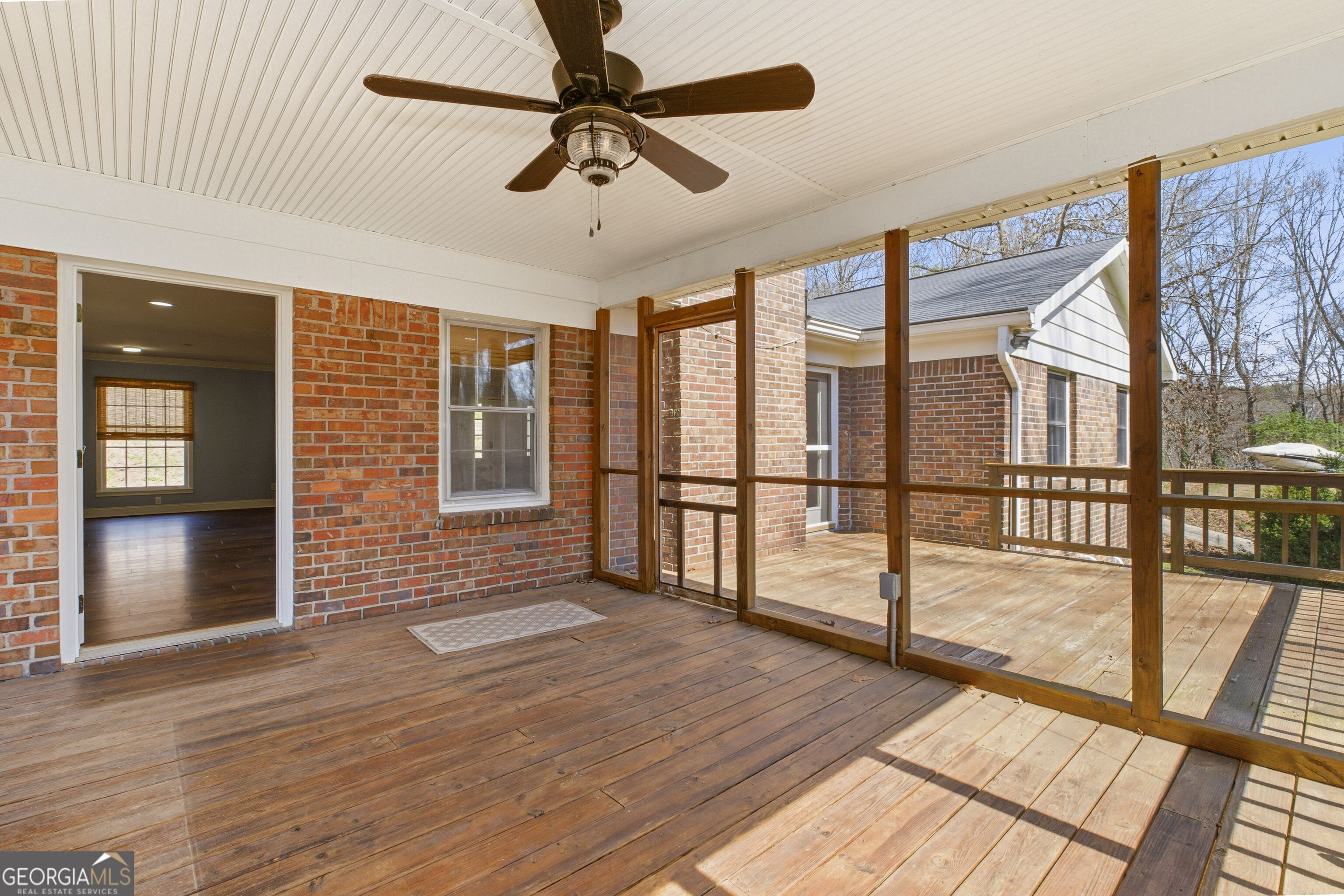 3302 Hickory Point Gainesville, GA 30506 - Photo 39 of 73 a view of a room with wooden floor and iron stairs
