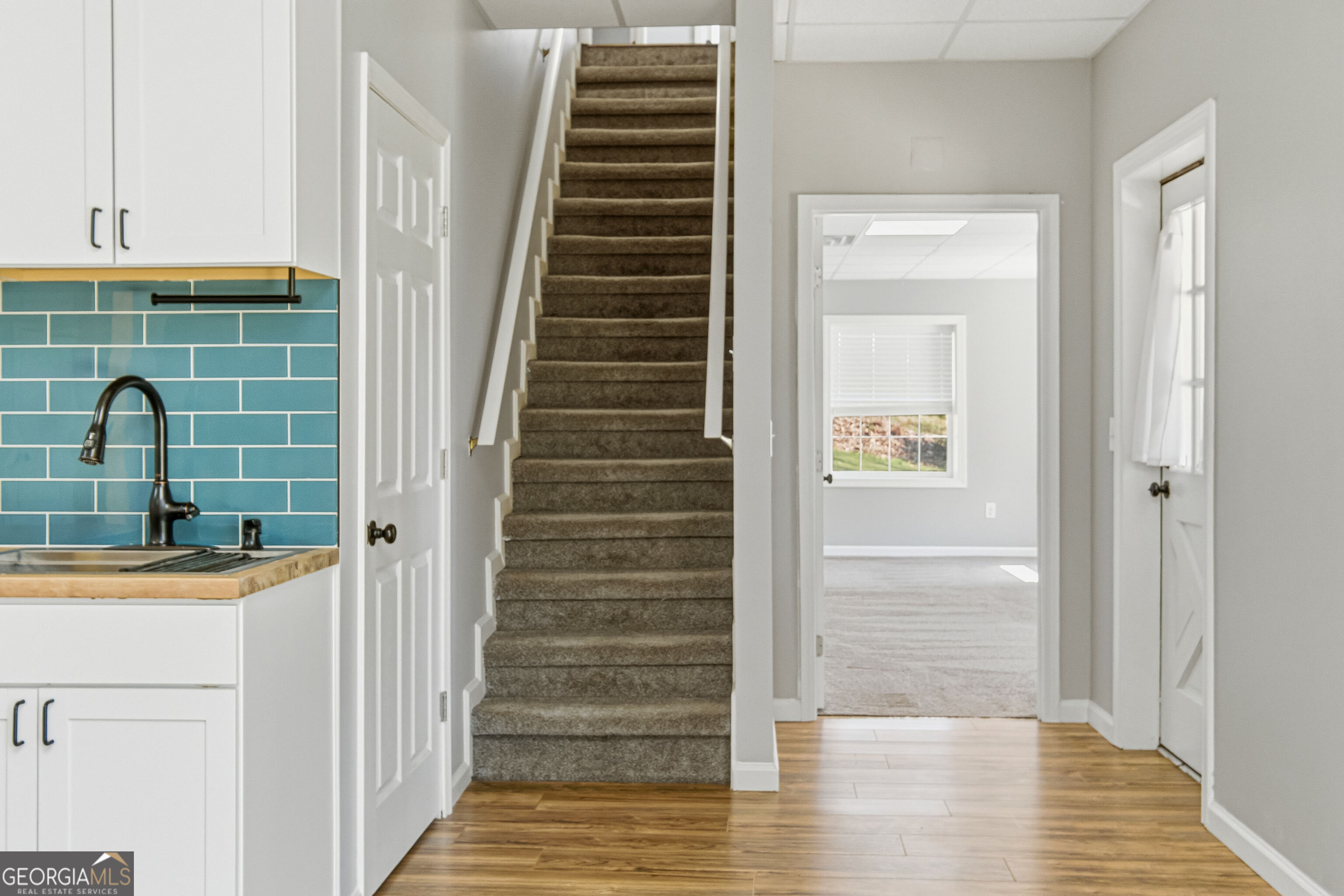 3302 Hickory Point Gainesville, GA 30506 - Photo 43 of 73 a view of a hallway with wooden floor and entryway