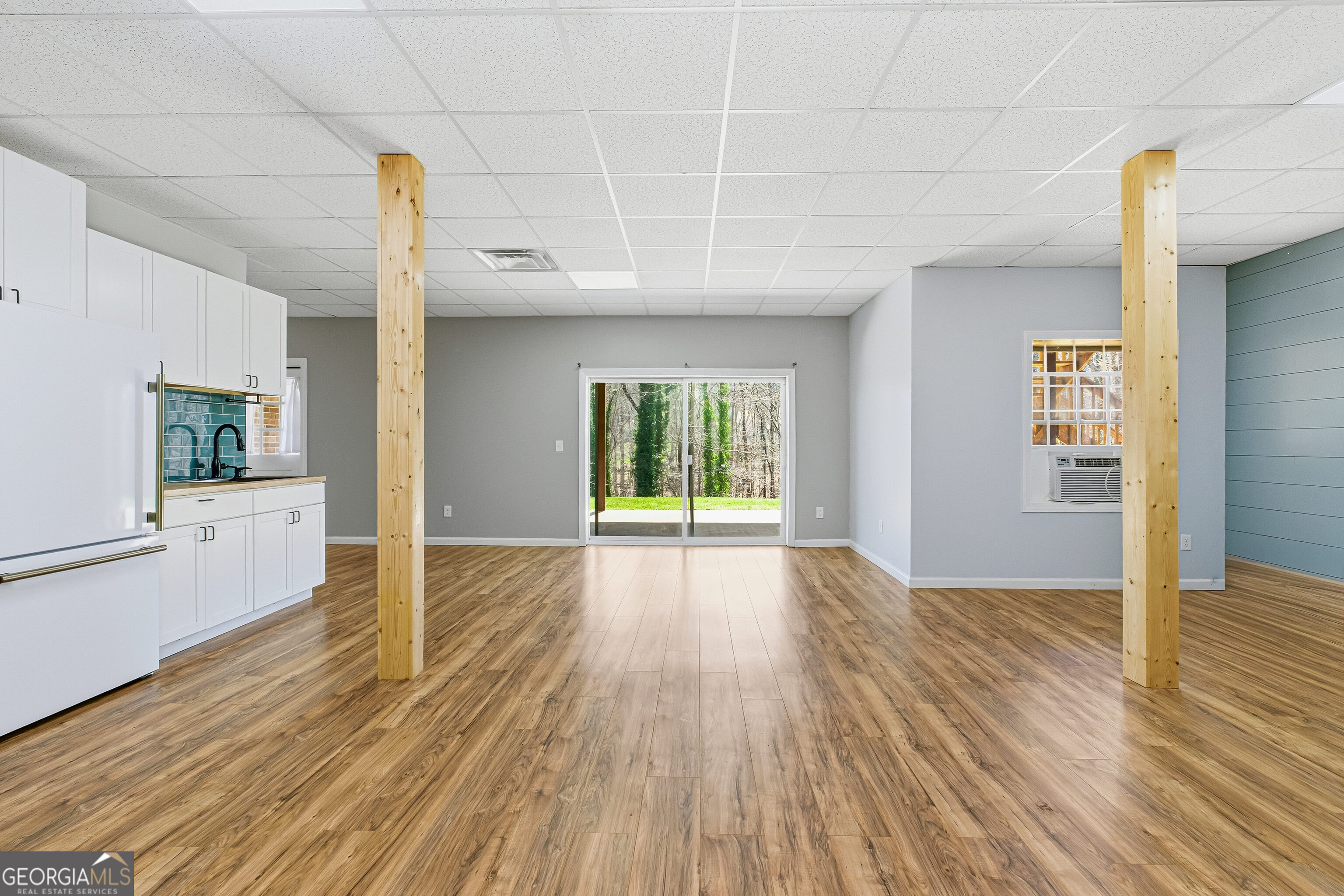 3302 Hickory Point Gainesville, GA 30506 - Photo 51 of 73 a view of an empty room with wooden floor and a window