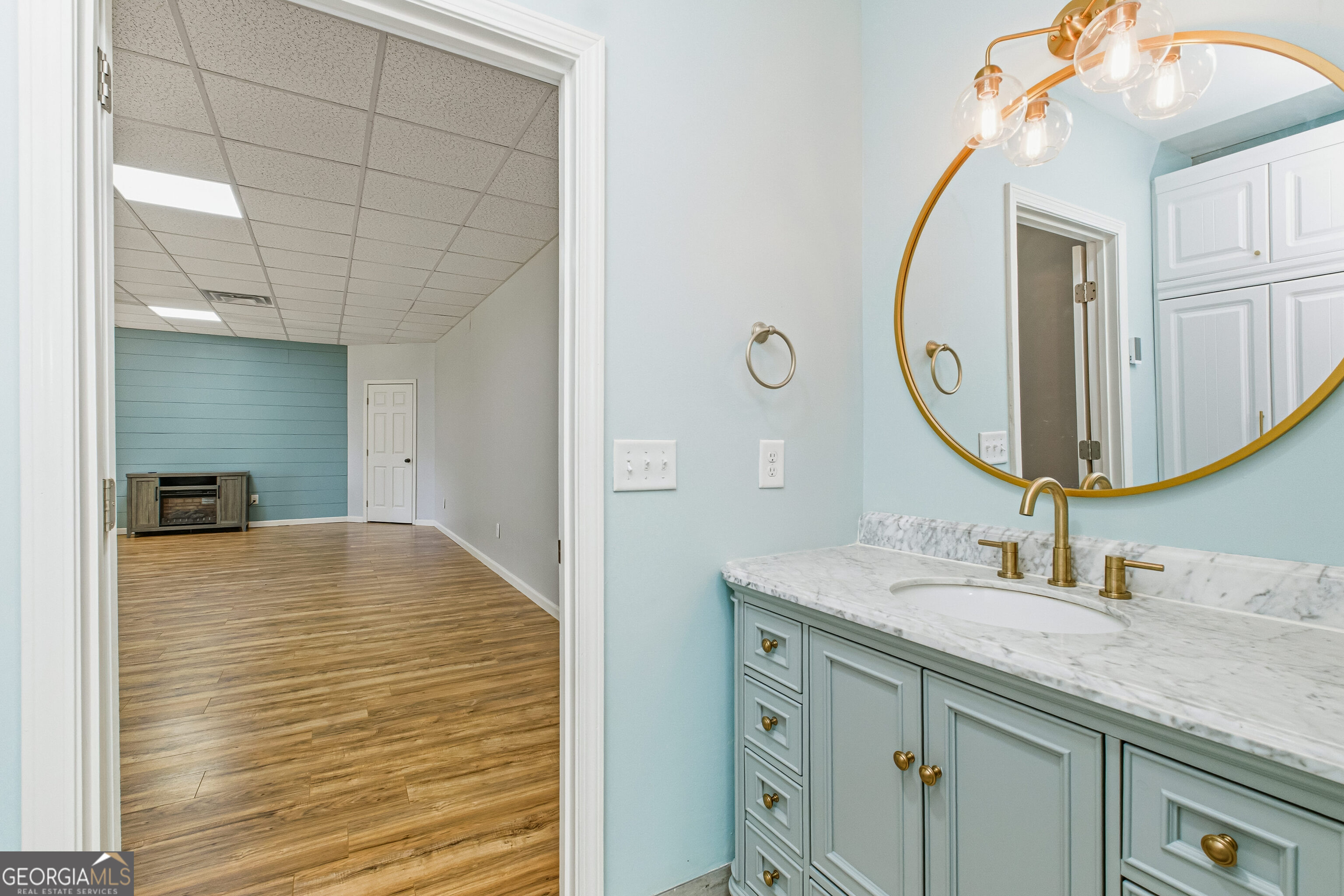3302 Hickory Point Gainesville, GA 30506 - Photo 53 of 73 a bathroom with a sink vanity and a mirror